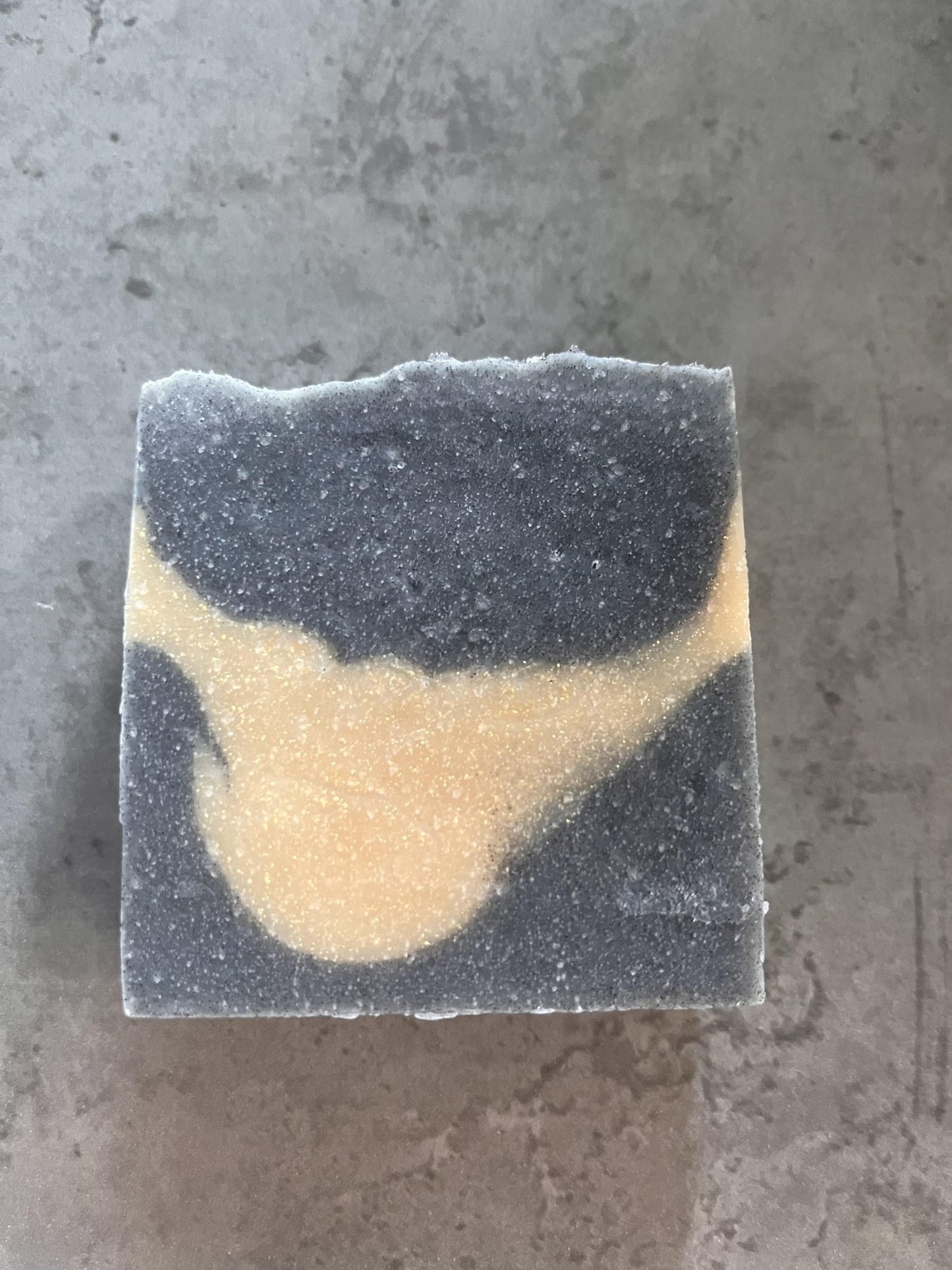 Aventos Kreed cold processed soap - Selfish Fine Soaps. This is a cold processed handmade soap. It is yellow and grey with a swirl pattern. It is fragranced with Aventos Kreed fragrance oil and smells amazing.