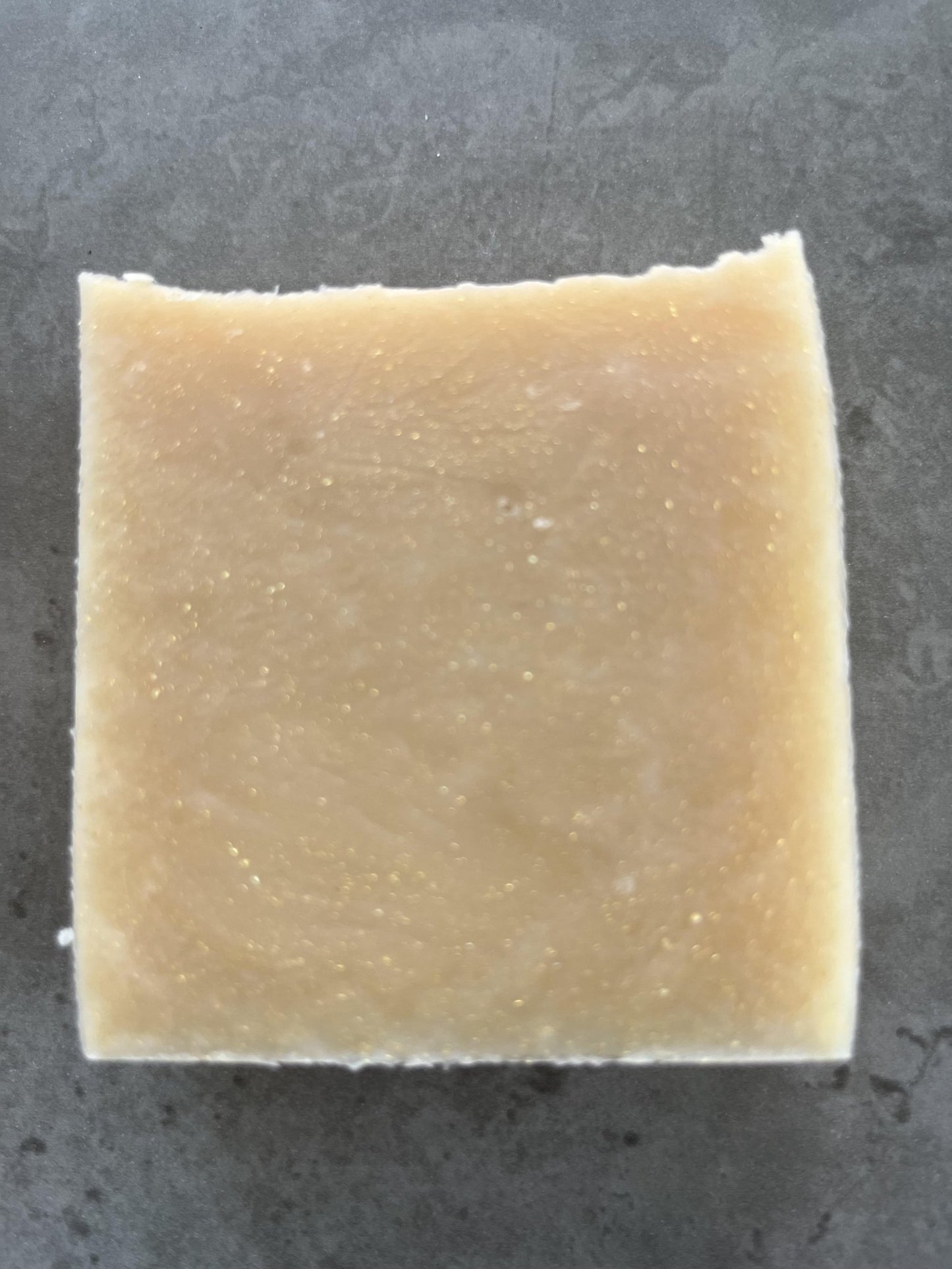 I adore cold processed soap - Selfish Fine Soaps. This is a bar of handmade cold processed soap made from natural ingredients. It is perfumed with J'adore fragrance oil and smells lovely. It is cream in colour and has a slight glitter.