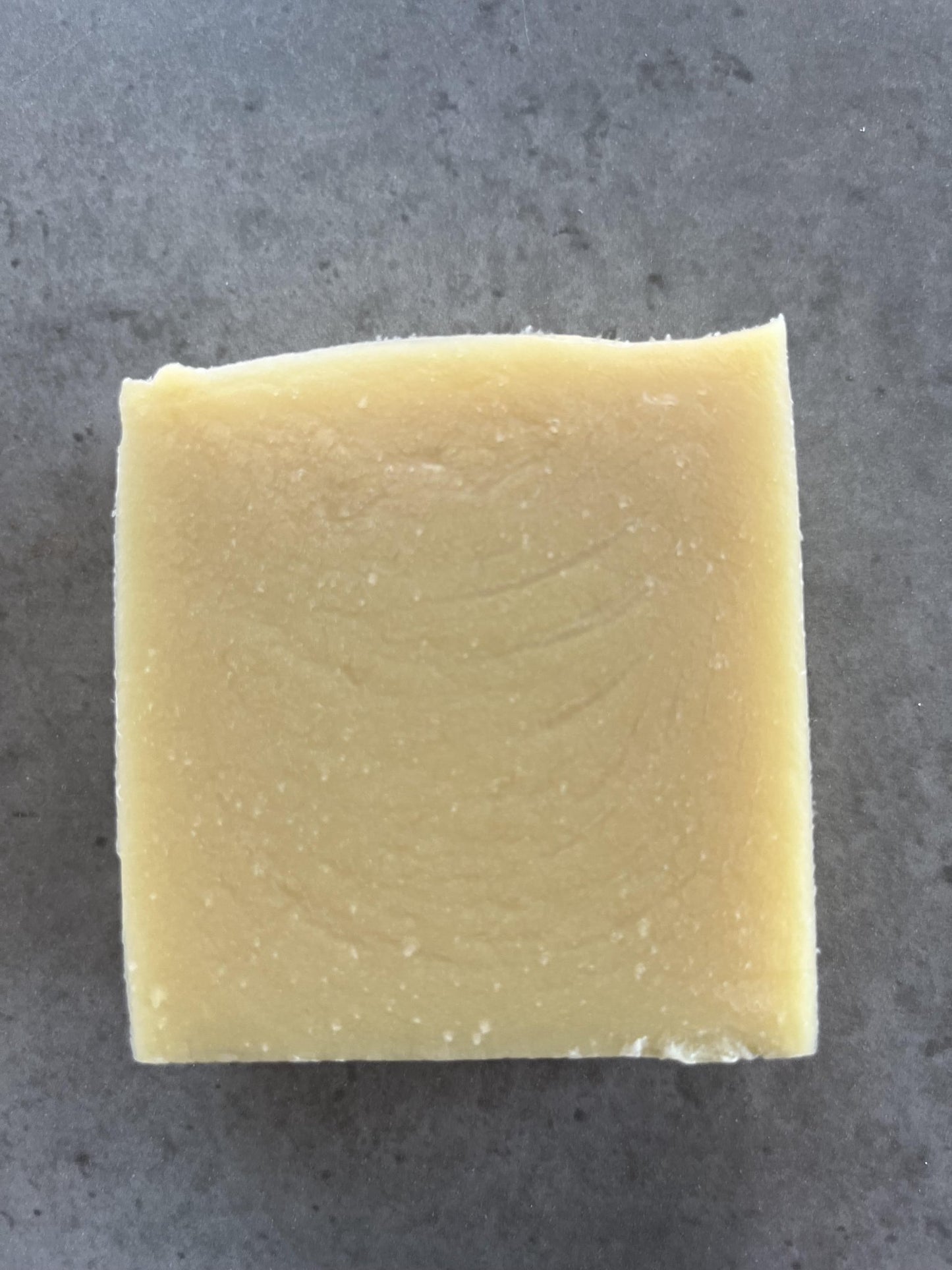 Jasmin sambac and marigold cold processed soap - Selfish Fine Soaps. This is a bar of handmade cold processed soap. It is perfumed with a dupe of Jo Malones jasmin sambac and marigold fragrance. It smells amazing. It is cream in colour.