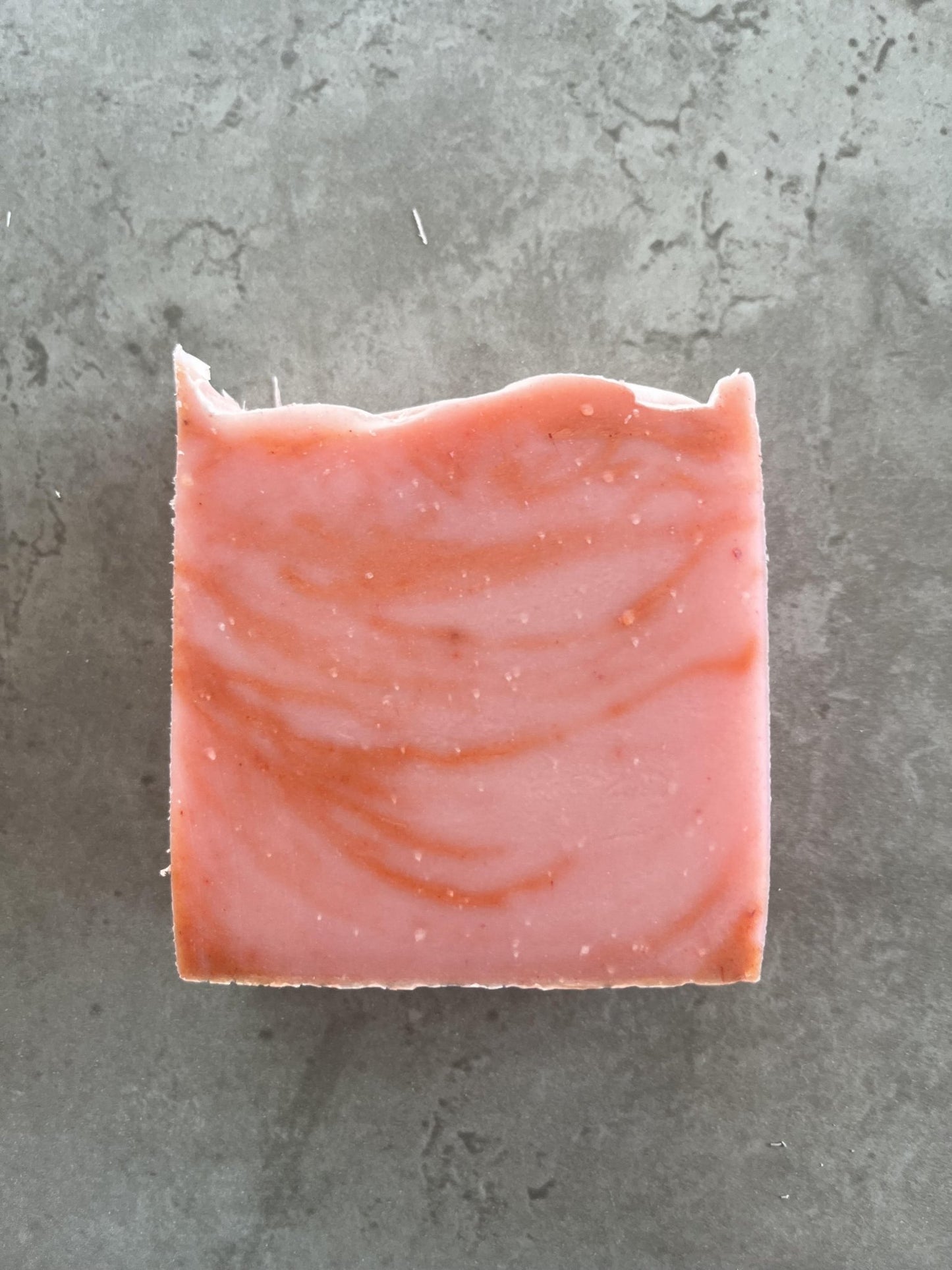 Rhubarb and rose bundle - Selfish Fine Soaps. This is a bar of handmade cold processed soap. It is dark and light pink swirl in colour. It is perfumed with rhubarb and rose fragrance oil which smells amazing. It is our highest selling soap.